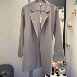 Never worn Gray light trench coat. Size large. Prologue. Great for spring!